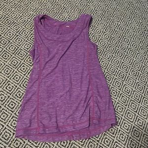 Running tank top with ruffles in the back.